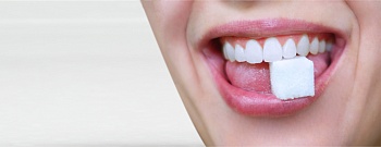 Как сахар влияет на зубы?