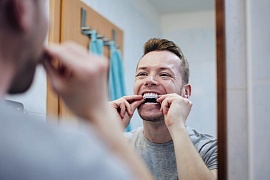 Выпирающие зубы: причины появления и способы коррекции